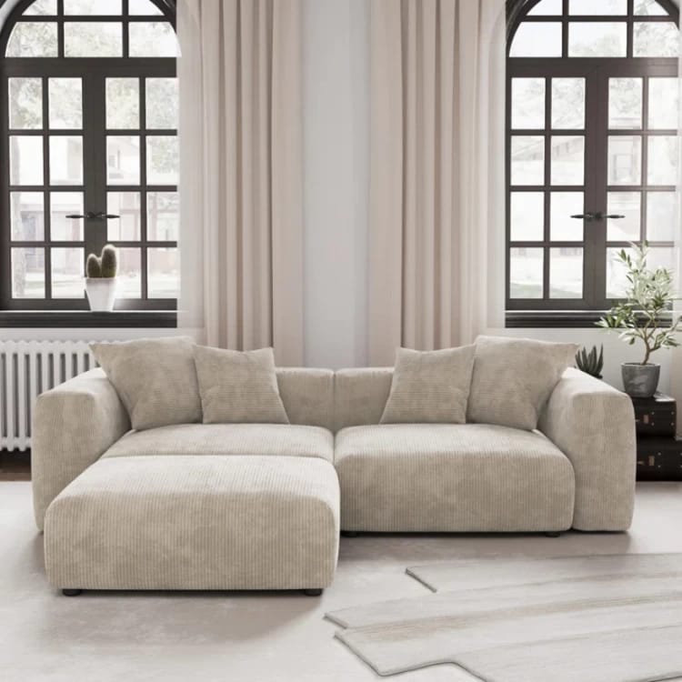 Warm family living room with an AuraDei sofa